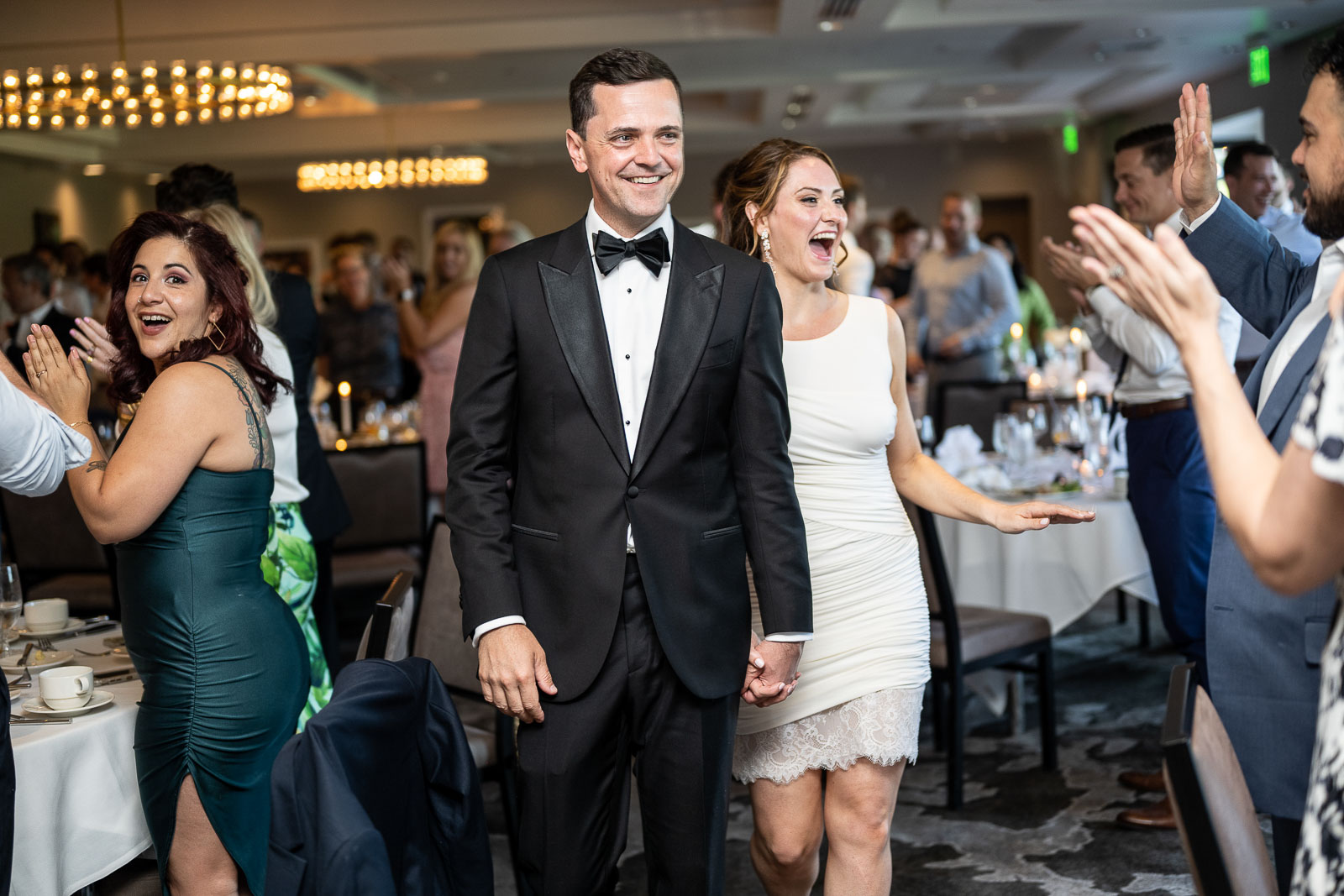 bride and groom enter reception at a seattle wedding venue