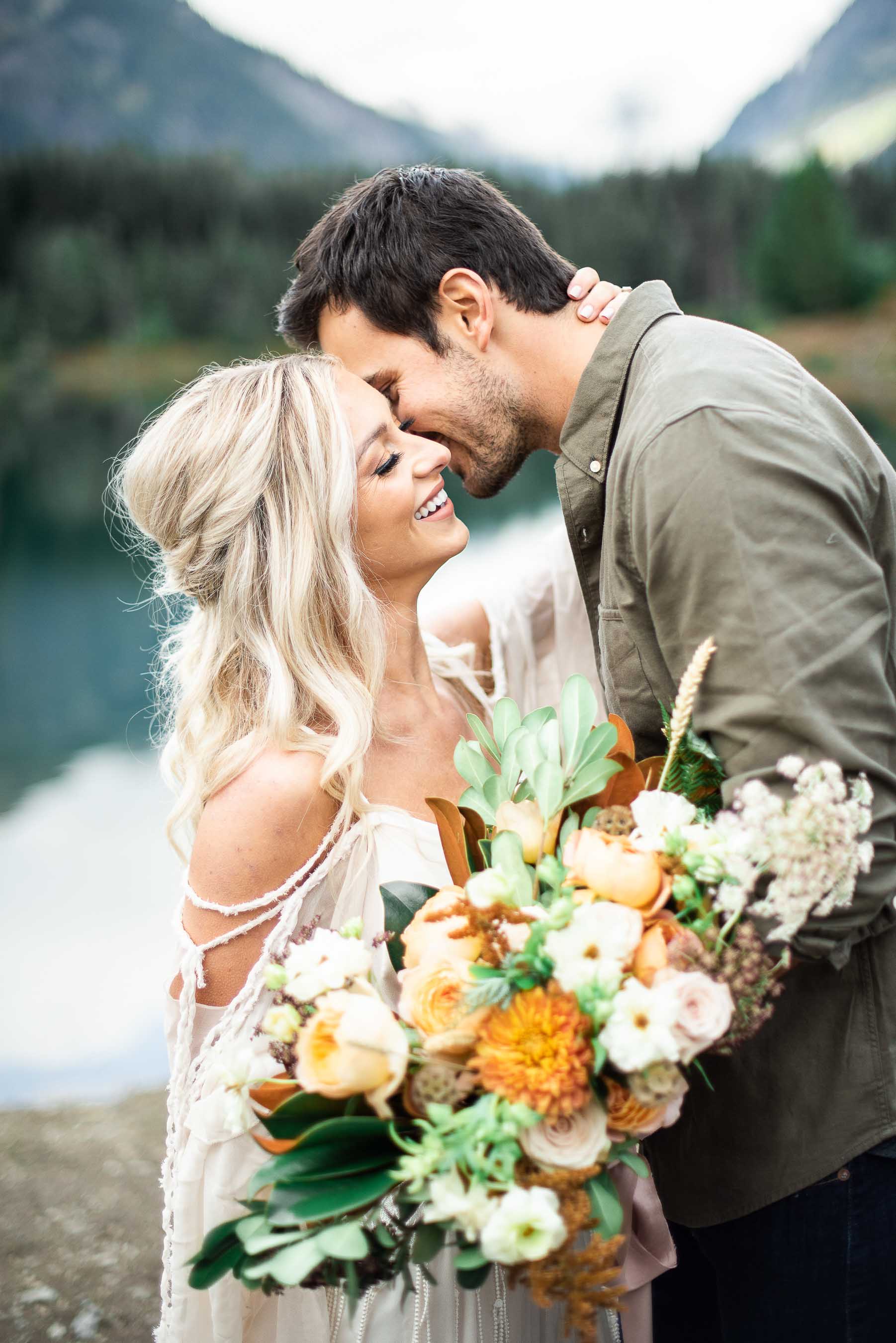 couple shares moment on wedding day outside of seattle